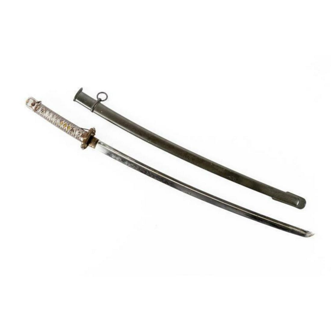 WWII Japanese Type 95 NCO Katana Sword: World War II Imperial Japanese Army Type 95 Shinto Gunto Katana Sword for a non commissioned officer, produced by The Tokyo First Arsenal. The copper fuchi bears a Tokyo First Arsenal sword makerâ€