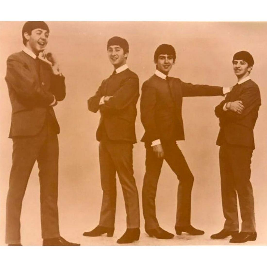 The Beatles Sepia Photo Print: The Beatles sepia-tone photo print. Created in the early 1990's for The American Heritage Galleries. Printed on cardstock. 8" X 10".