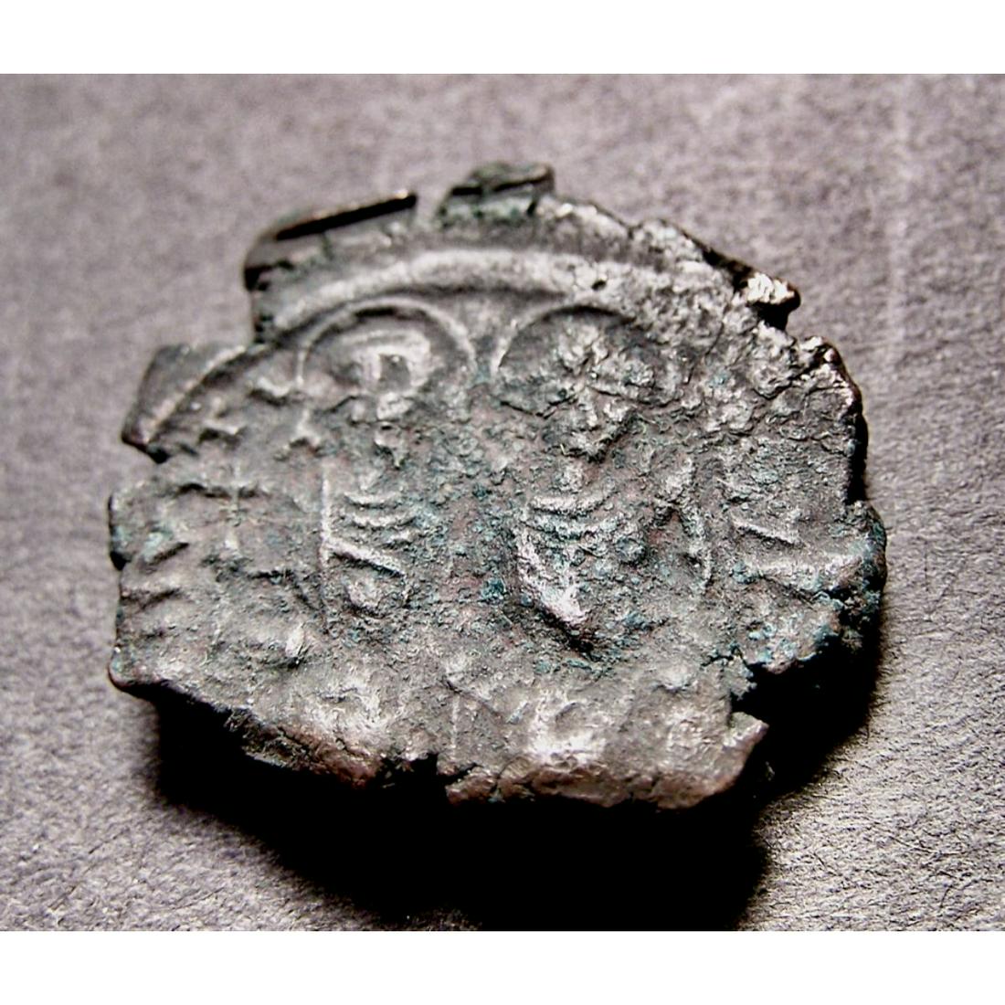 Ancient Byzantine Emperor Justin II AE Coin: JUSTIN II, Byzantine Emperor, 565 A.D. â€“ 578 A.D coin. JUSTIN II & Empress Sophia, AE Half-Follis ( 19-23 mm, 5.75 gm ) OBV: DN IVSTINVS PP AVG, Justin on left, Sophia on right, seated facing o