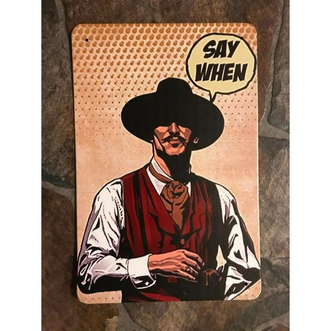 Tombstone, Doc Holliday Metal Pub Bar Sign: "Say When" - Doc Holliday caricature, comic book-style metal pub bar sign, of the 1993 movie Tombstone. 7 7/8" X 11 3/4" with pre-drilled holes for mounting.