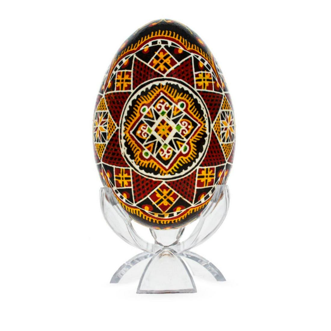 Ukrainian Handcrafted Batik Goose Egg: Ukrainian hand-decorated, blown out, batik technique goose egg. Comes with plastic stand. 3 1/4" H X 2" W.
