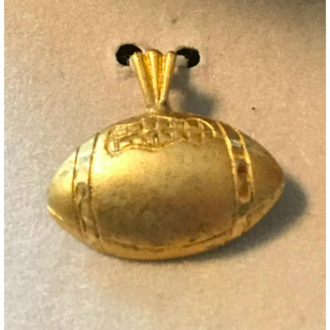 Vintage Football Charm: Vintage vermeil, 14kt gold over sterling silver, football charm. In original store case, stamped B. David. 1" L X 5/8" W.