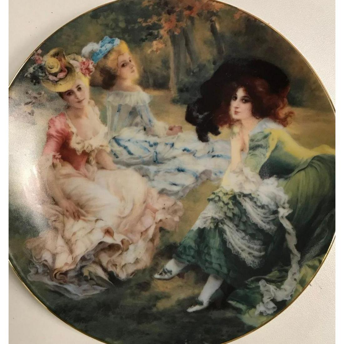 Limoges Porcelain Plate, Elegant Rococo Ladies: Limoges porcelain display, dessert portrait plate with gilt edging. Scene of elegant 18th Century rococo style ladies posed within a landscape. Stamped on reverse "Porcelaine LG Limoges - Dec a la mai