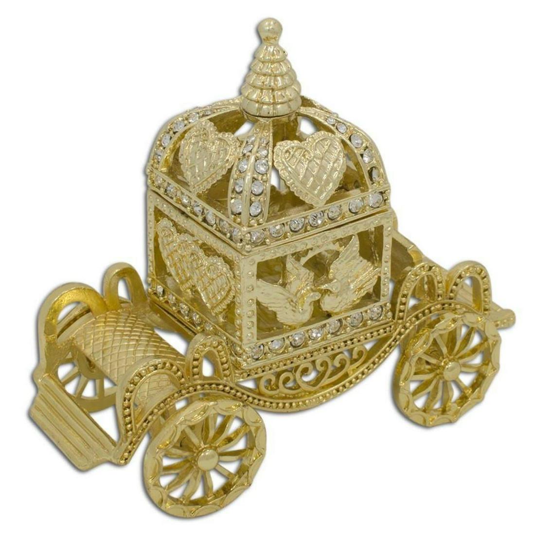 Golden Royal Coronation Coach Trinket Box Figurine: Russian hand-made Royal gilt coronation coach, after the original designs created for the Russian Royal family by Carl Faberge. The tiny gilt over pewter coach rolls on its tiny wheels, the center box