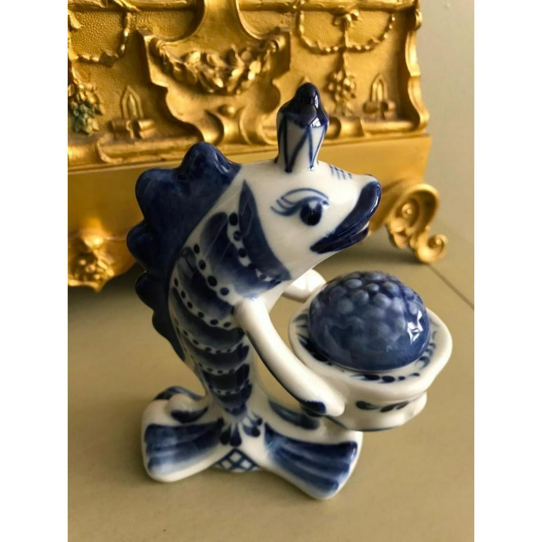 Russian Handpainted Porcelain Fish Caviar Server: Russian Gzhel hand-painted porcelain standing fish form salt or black caviar server. To round lid lifts up to reveal small bowl. Beautiful & unique serving piece. 5 1/2" H X 2 1/2" W.