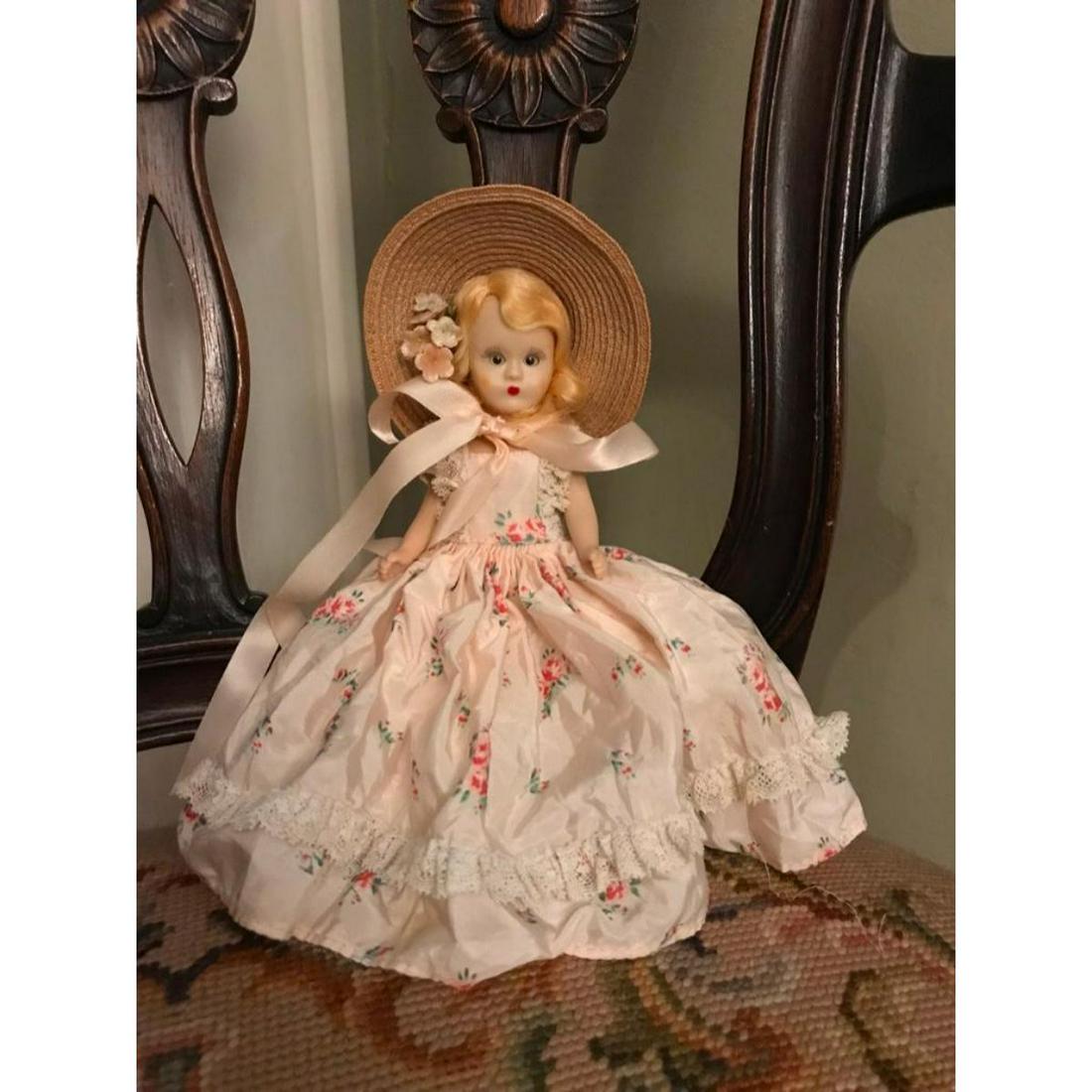 1940's Nancy Ann Doll, Southern Belle: 1940's - 1950's Nancy Ann doll, Southern Belle with strawberry blonde hair, straw hate with ribbon, moving eyes, flowered pink dress & pantaloons.*** Crinoline underneath dress appearing torn, shredde