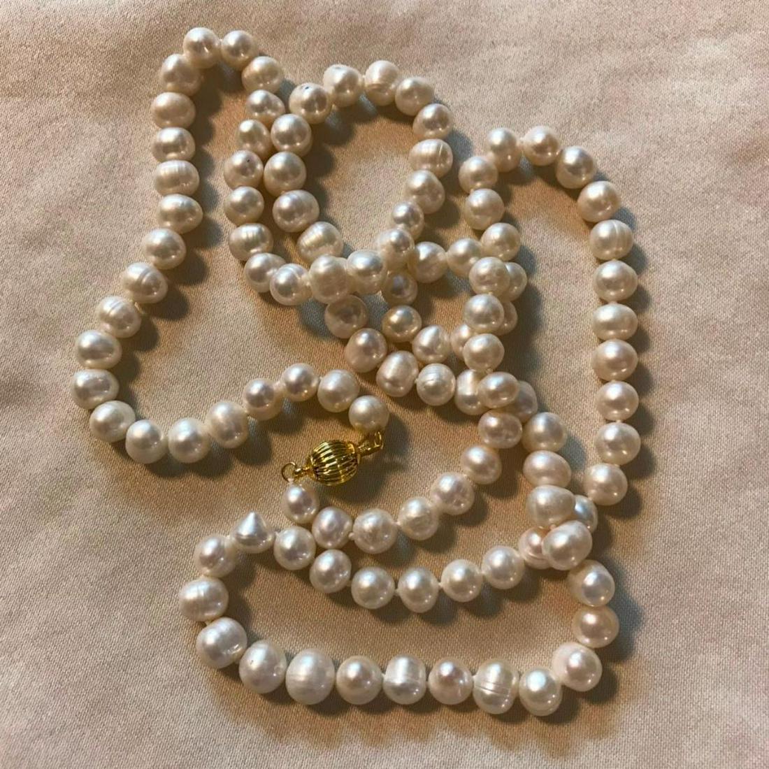 8-9mm Cultured Pearls 36" Necklace: 8-9mm white cultured pearls 36" opera length necklace with 14kt yellow gold ball clasp. *** off round, Baroque shaped, some ringed, some dented & many with mixed luster.
