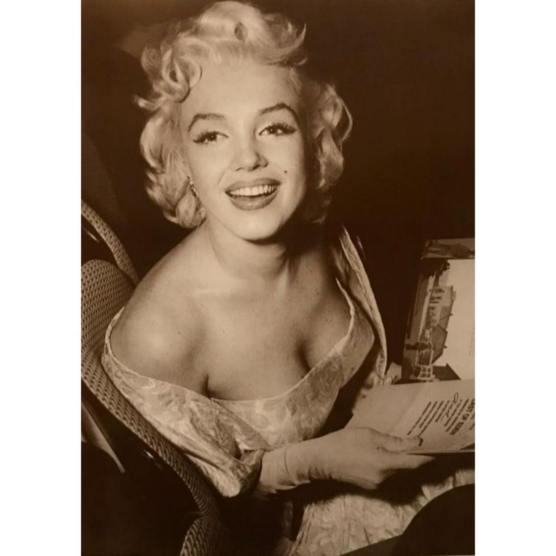 Marilyn Monroe Photo Print: Marilyn Monroe holding a program for the premiere of East of Eden, sepia-tone photo print, created in the early 1990's for The American Heritage Gallery. Printed on cardstock. 11" X 14".