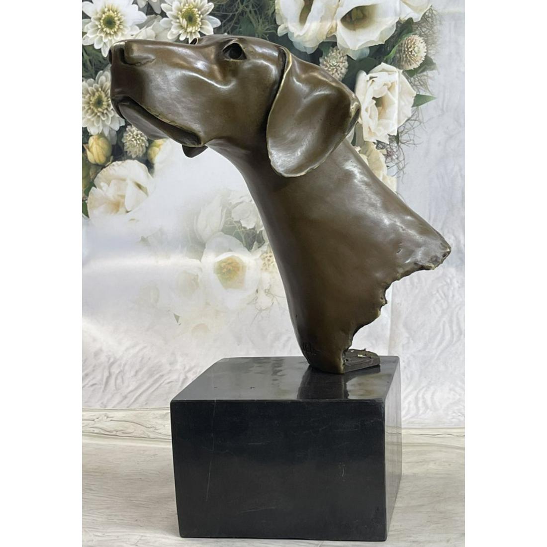 Weimaraner Hunting Dog Bronze Sculpture: Bust of a Weimaraner Hunting Dog sculpture. Lost wax casting method bronze, with brown patina, mounted on a marble base. Signed by the artist on the reverse, Milo. 15 1/2" H X 11" W. 20lbs.