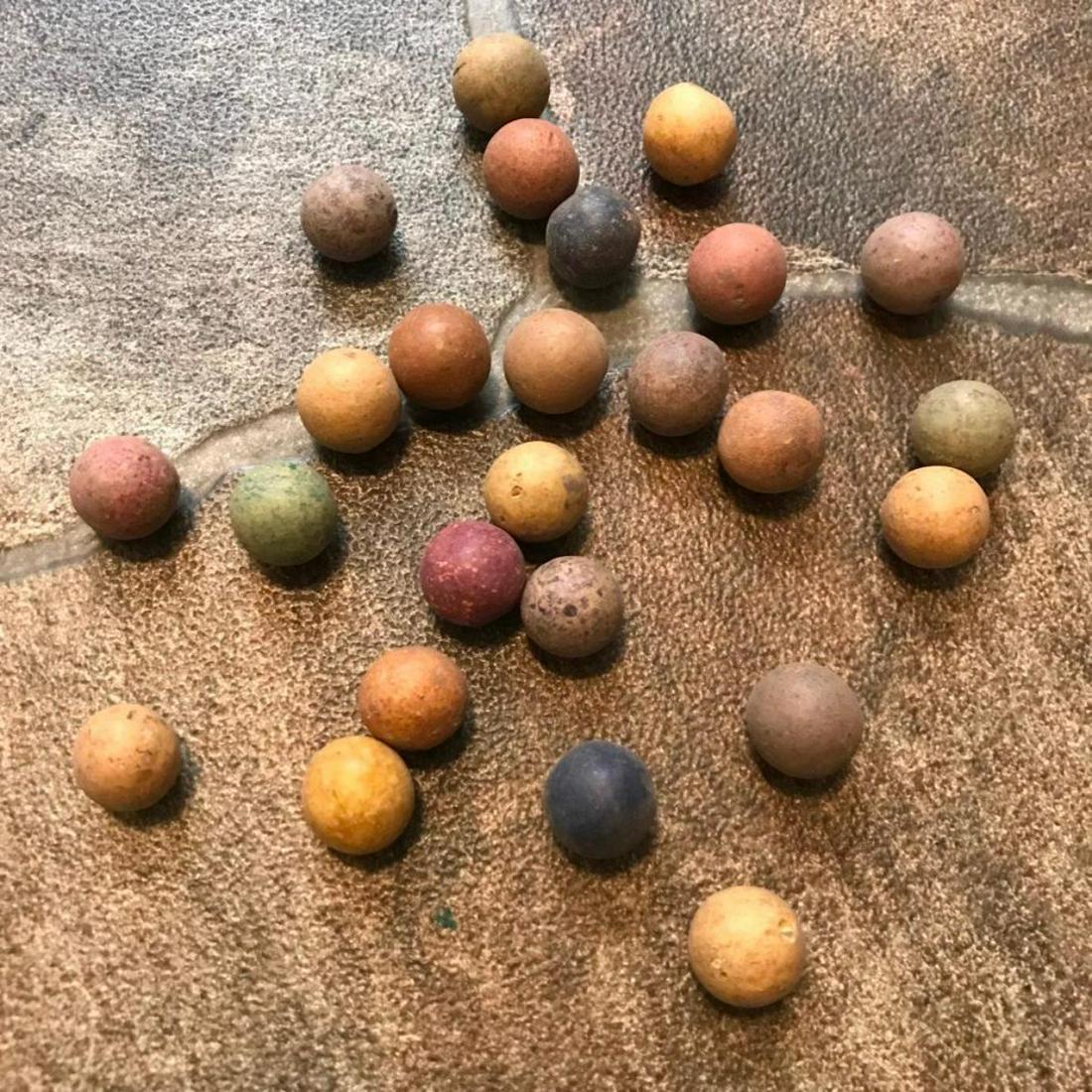 19th Century Clay Children's Marbles: Group of 25 colorful clay children's toys, marbles from the 19th Century. 15mm sized marbles.