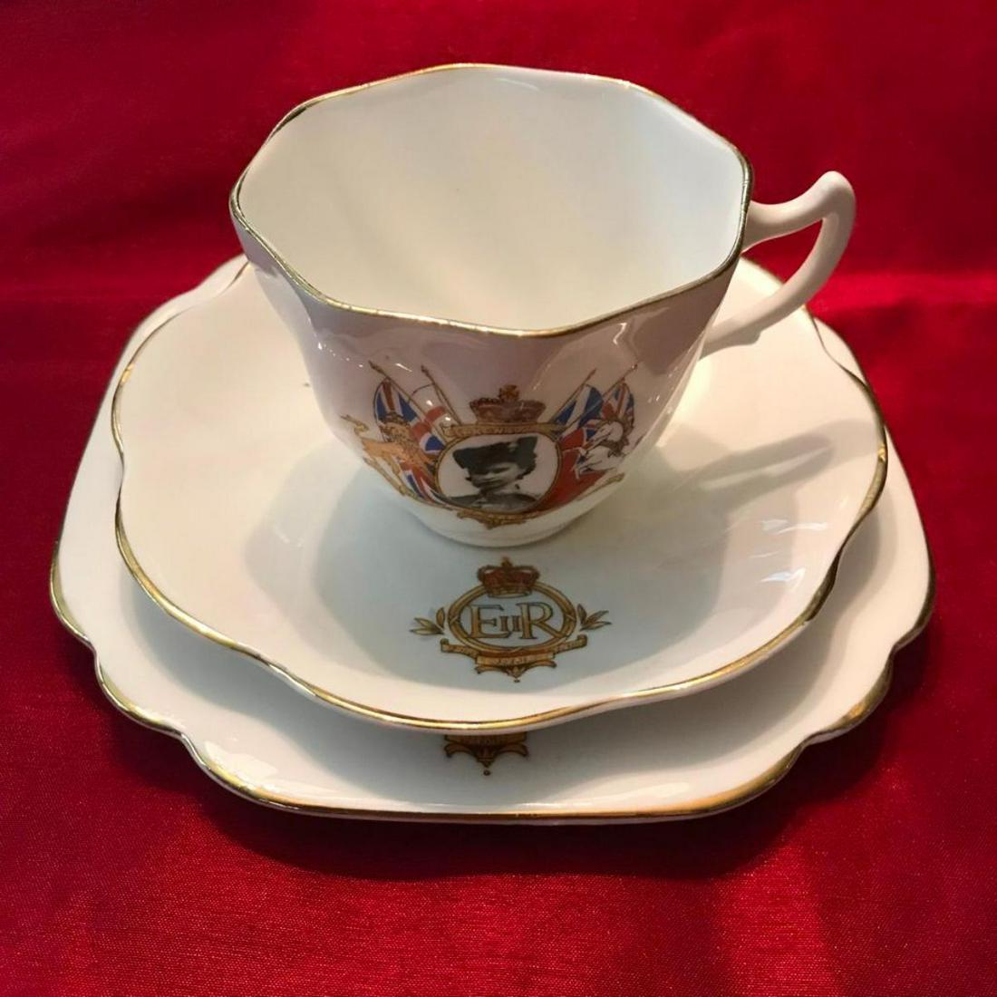 1953 Queen Elizabeth II Coronation Teacup Set: 1953 Queen Elizabeth II commemorative Coronation tea cup & saucer, plate set by Rosina bone china, Made in England. With black & white portrait of the Queen surrounded by Royal Coat of Arms on each pi