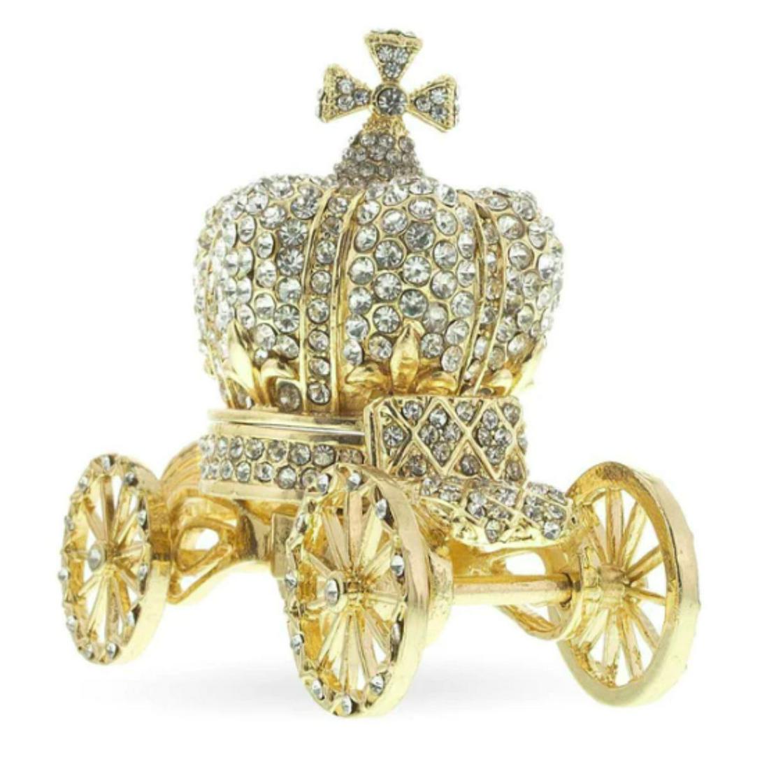 Royal Crown Coach Trinket Jewel Box: Royal Crown Coach trinket, jewel box. Hand-painted gilt over pewter with embedded Austrian crystals. The little crown portion lifts off the coach with a magnet at base to hold it secure. The crown ope