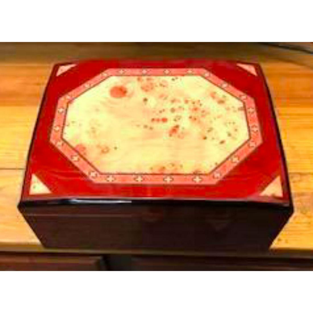 Large Hand-made Humidor Treasure Chest: Large humidor-treasure chest in Daniel Marshall style. Handmade by Cuban Crafters.12x10x5 size ( large ). Heavily lacquered & inlaid wood. A beautifully made humidor.