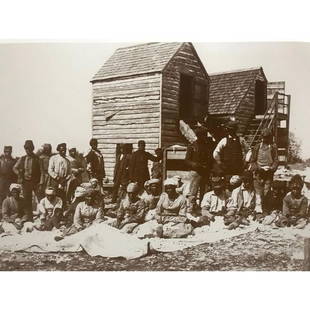 African American History, Slaves Sorting Cotton: African American History, Slaves sorting cotton in front of a Civil War era cotton gin sepia-tone photo print. Created in the early 1990's for The American Heritage Galleries, after an original