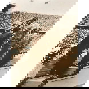 African American Olympic Games History, Jesse Owens: African American History, Black Americana theme. 1936 Olympic games in Berlin Germany. Jesse Owens receiving gold medal. Sepia tone photo print, on heavy card stock. In original packaging from The Ame