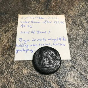 Ancient Greek Bronze Zeus Coin, 212 BC: Ancient Greece, Greek city of Syracuse in Sicily, AE bronze coin, struck after 212 B.C. under Roman rule. 21mm. Obverse - laureate head of Zeus, father of the gods, facing left. Reverse - winged Nike