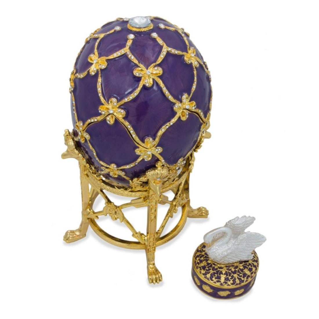 Russian Enamel Swan Trinket Jewel Box Egg: After Faberge's 1906 Swan Trinket Box Egg, Russian enamel & gilt over pewter, with embedded Austrian crystals. The replica egg lifts off the gilt stand & opens at center, with magnetic closure, to rev