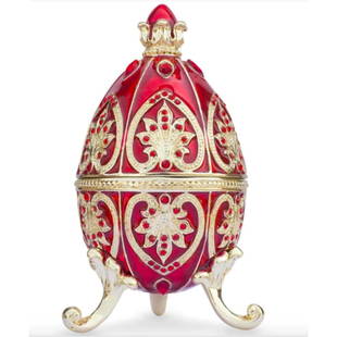 Russian Royal Ruby Trinket Box Egg: Russian Royal Ruby trinket box, egg. Enamel & gilt over pewter, with embedded Austrian crystals. The ornate egg opens at center with latch to reveal an enameled interior for storing trinkets or