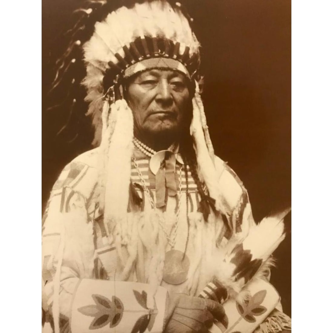 Chief Plenty Coups, Crow Nation, American Indian Photo Print: Native American history theme, Crow Nation, Chief Plenty Coups, the last traditional Chief, c. 1913 sepia-tone photo print. Created in the early 1990s for The American Heritage Galleries, printed on h