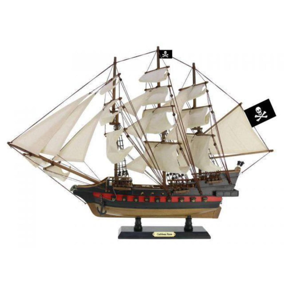 Limited Caribbean Model Pirate Ship: Caribbean Pirate Limited wooden model pirate ship. Fully assembled with all 22 hand sewn white cloth sails mounted.Handcrafted wooden hull & masts & on deck wooden lifeboat with oars. On wooden displa