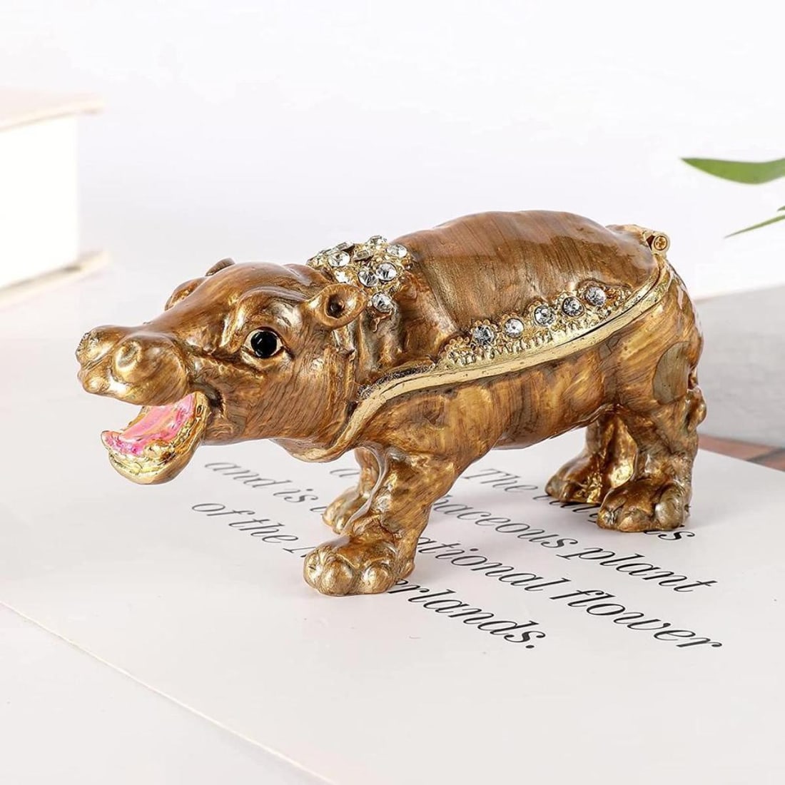 Little Hippo Trinket Jewel Box: Little Brown Hippo trinket, jewel box. Enamel & gilt over pewter, with embedded Austrian crystals. The little box opens at center, with magnetic closure, to reveal an enameled interior for storing tri