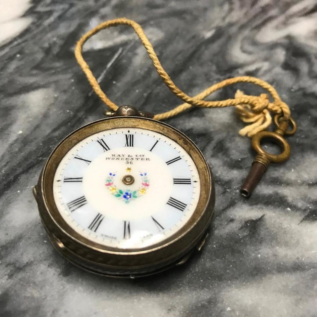 Late 1800s Kay Worchester 15 Jewels Pocket Watch: Late 1800s Kay & Co Worchester solid silver 15 jewels Swiss Made pocket watch. Painted enamel & gilt porcelain face with Roman numerals. Stamped 935 silver on inside back cases, along with K, C & W wi