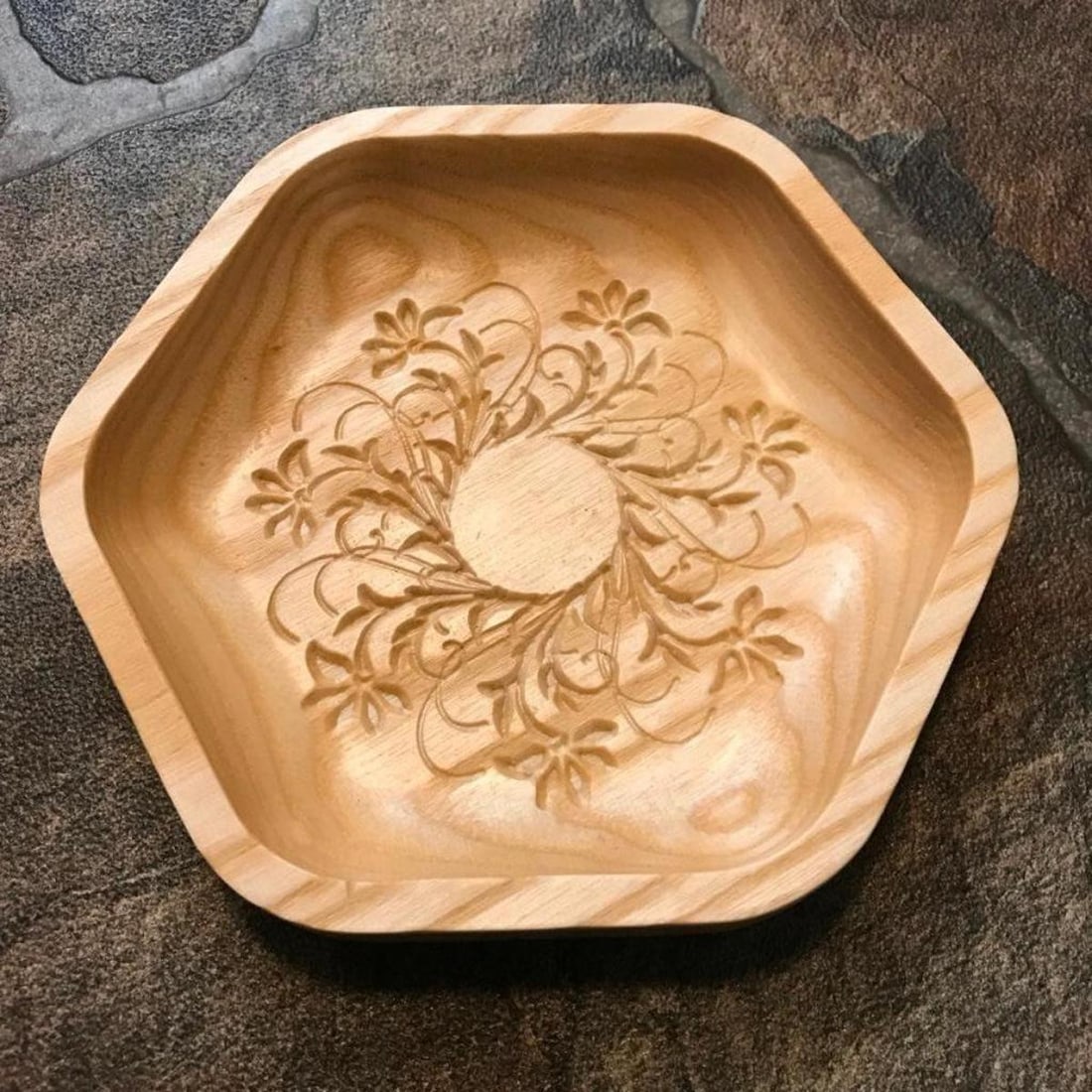 Lituanian Pressed Wood Candle Platter: Pressed linden tree wood with floral design, candle platter or small tray. Created by a Lithuanian artisan. Natural wood with hard wax oil finish. 5 1/2" X 6" X 3/4" D