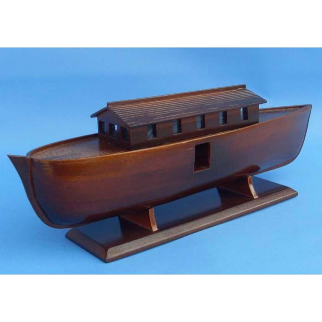 Wooden Noah's Ark Model Boat: Noah’s Ark Model Ship. Hand-crafted wooden display model with attached base. 14" L X 5" W X 6" H.