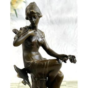 Girl With Bird Bronze Sculpture