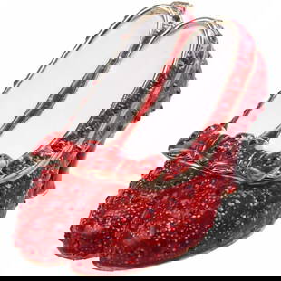 Ruby Slippers Wizard of Oz Trinket Jewel Box: Ruby Slippers from the movie The Wizard of Oz. Enamel & gilt over pewter, with embedded Austrian crystals. The top of the tiny shoes lifts up on a hinge, with magnetic closure, to reveal an enameled i