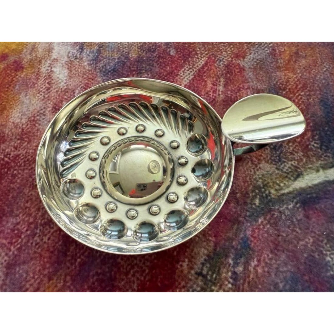 CHRISTOFLE Tastevin Wine Tasting Sommelier Cup: CHRISTOFLE France, Vintage silver-plate tastevin, wine taster cup for Sommeliers. Stamped CHRISTOFLE. 3 1/2" D. * very slight irregular shape to the edge of the right side, per photos.