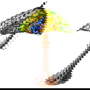 Tropical Leaf Stained Art Glass Table Lamp: Tiffany style, stained art glass, 2-light table lamp with a tropical Monstera leaf patterned shade. Created using 288 hand cut pieces of stained art glass & 21 glass beads wrapped in copper foil with