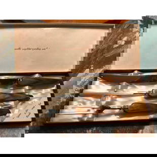 Mid Century English Stainless Wood Carving Cutlery Set: Mid Century Burns, English stainless steel, wood cutlery carving set in original box from 1964. Set includes: 13" carving knife, 2 tine 10" serving fork & 11 1/2" sharpening steel. Never Used.