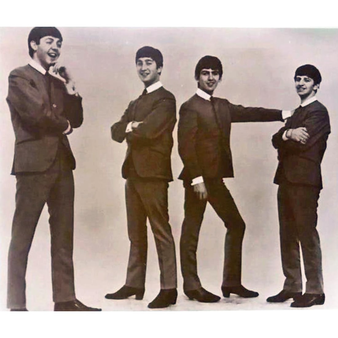 The Beatles Photo Print: The Beatles sepia-tone photo print. Created in the early 1990s for The American Heritage Galleries. Printed on card stock. 8" X 10".