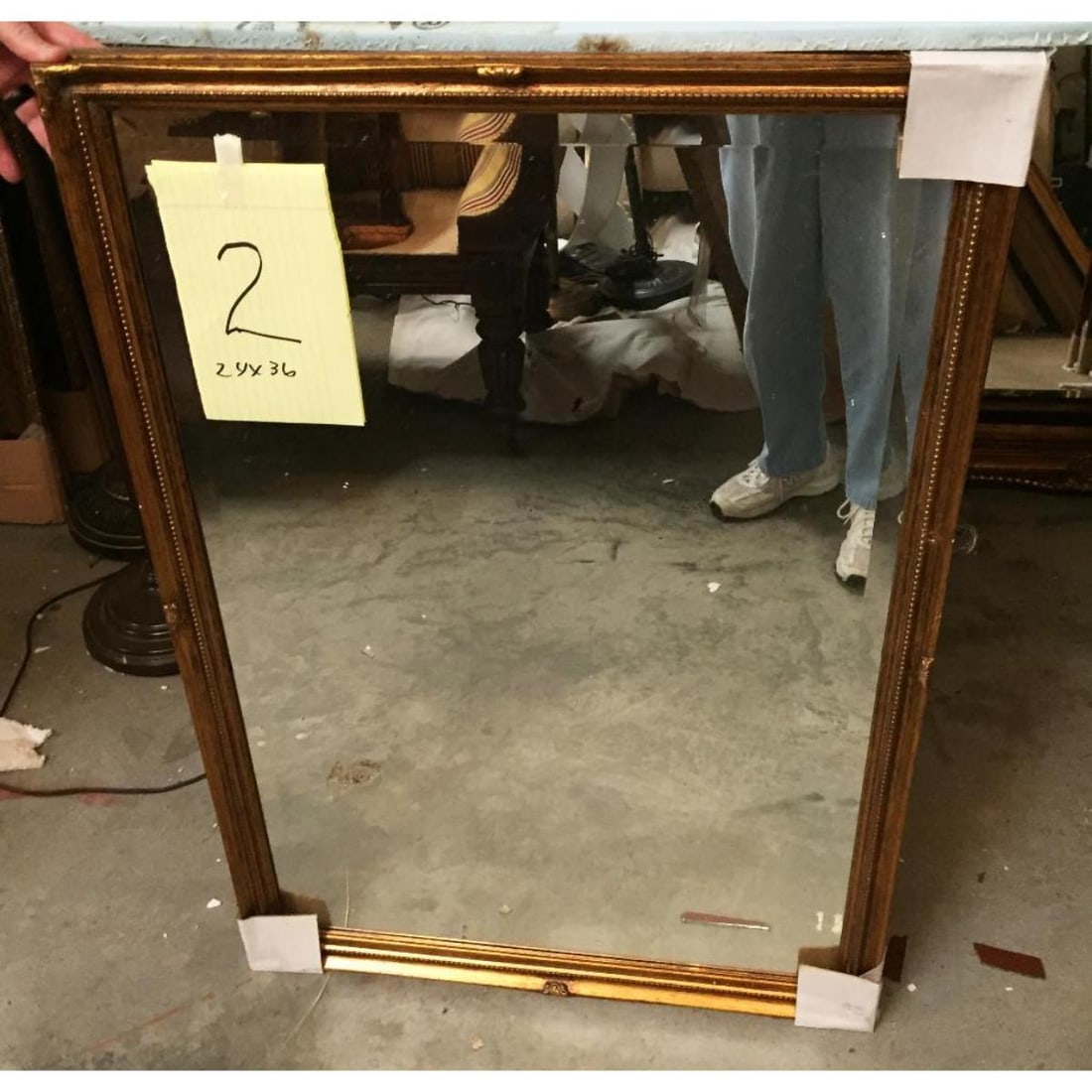 Antique Style Carved Gilt Wood Beveled Mirror: Antique style, beaded, gilt over hand carved wood frame inset with beveled mirror glass. 24" X 36" glass. 27" X 39" overall frame size. Can hang either vertically or horizontally. *** multiples of thi