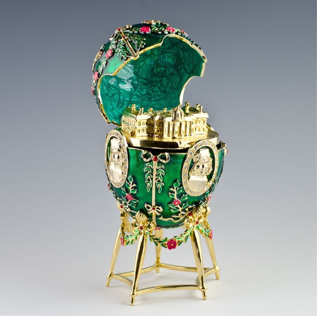Alexander Palace Faberge Inspired Egg: The nephrite egg is adorned with five miniature portraits of the children of Tsar Nicholas II and Alexandra Fedorovna, and contains a replica of the Alexander Palace at Tsarskoe Selo. The oval portrai