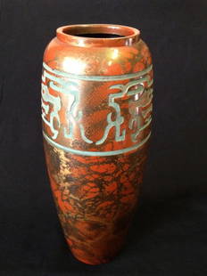 An oriental bronze vase with a marbled patina: A Oriental Bronze Vase With Marbled Patina And Chased Symbol Decoration , Impressed Mark To The Base, 10 Inches High.