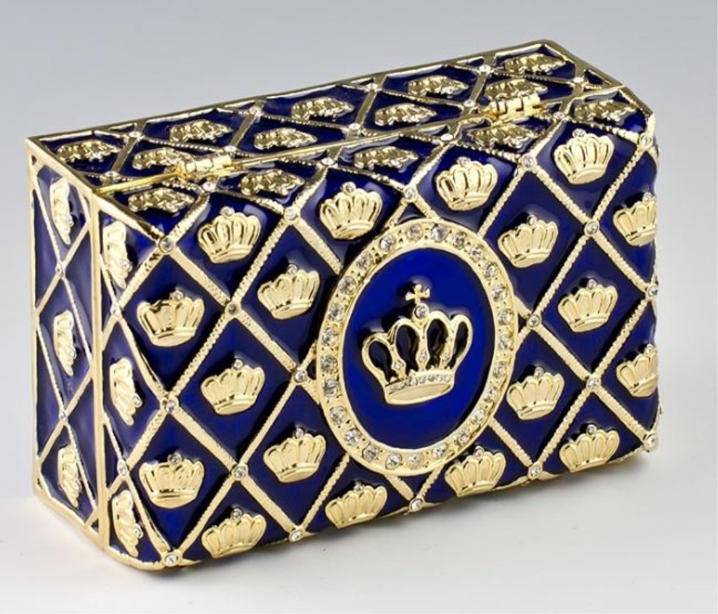 Imperial Crown Faberge Presentation Box: Faberge Inspired Imperial Crown Presentation Box ¥3.75'' (L) X 2.5'' (W) X 1.5" (H) ¥15.5 oz ¥Pewter, Crystals, Enamel This box has blue translucent enamel under the crystal ornamentations in the f