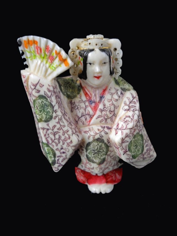 Signed Hand Carved Ivory Female Netsuke: Signed Hand Carved Ivory Female Netsuke measures 2 inches tall