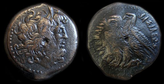 Ptolemy IV Philopator Greek Ancient Coin: Ptolemy IV Philopator Egypt Bronze AE Authentic Ptolemaic Greek Ancient Coin. Weight 23.4 g. Diameter 30 mm. Diademed and horned bust of Ptolemy I Soter as Zeus Ammon right. Reverse: Two eagles standi