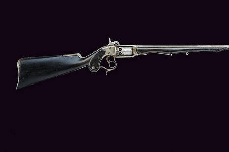 A Savage Revolving Carbine Two-stage, 9.5 mm cal.: A Savage Revolving Carbine Two-stage, 9.5 mm cal. barrel; six-shot cylinder, frame with address, wooden stock (small parts missing), articulated ramrod.¾dimensions: length 128 cm.¾provenance: