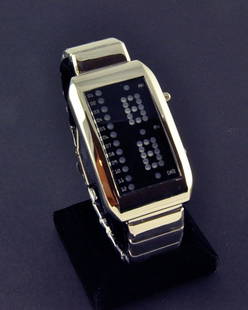 Men's Cyber Design Blue Led Wrist Watch: Men's Stainless Steel Cyber Design With Led Blue Light Display. Watch Has Time, Calendar Day, And Am/pm Led Display. Watch Has A Quartz Movement.