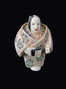 Signed Hand Carved Ivory Female Netsuke: Signed Hand Carved Carved Ivory Female Netsuke measures 2 inches tall