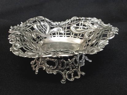 Late Victorian silver bon bon dish by Willia: A Late Victorian Silver Bon Bon Dish By William Comyns London 1890 Of Almost Heart Shape.(23 cms x 11.5 cms x 4.5 cms high)