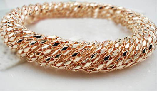 High Fashion Twisted Design Bangle Gold Tone Brace: High Fashion Twisted Design Bangle Gold Tone Bracelet, 2.5 inch diameter