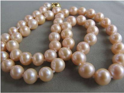 Akoya Round Pink Cultured Pearl Necklace: Akoya Round Pink Cultured Pearl Necklace. These Pearls Have A 14/20 Yellow Gold Filled Round Clasp. Strand Length Is 18".