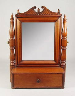 Folky American Shaving Stand: Folky American Shaving Stand ?Late 19th Century. Mahogany with poplar secondary. Folky carved pediment with acorn finials. Turned mirror supports. Dovetailed case and drawer. Refinished. 24 1/2" x