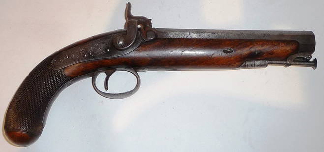 A 19th Century Percussion Cap Travelling Pistol: A 19th Century Percussion Cap Travelling Pistol, the 17.5cm octagonal steel barrel faintly engraved London, with foliate engraved side lock, walnut stock with chequered bag butt and steel swivel