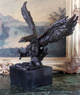 Magnificent Bronze Sculpture Landing Eagle: Landing Eagle Bronze Sculpture After F. Ratin 20H x 15W x 8.5D 32 lbs. This bronze sculpture was produced using the "Lost Wax" casting method. The "Lost Wax" Cast method is the most precise metal