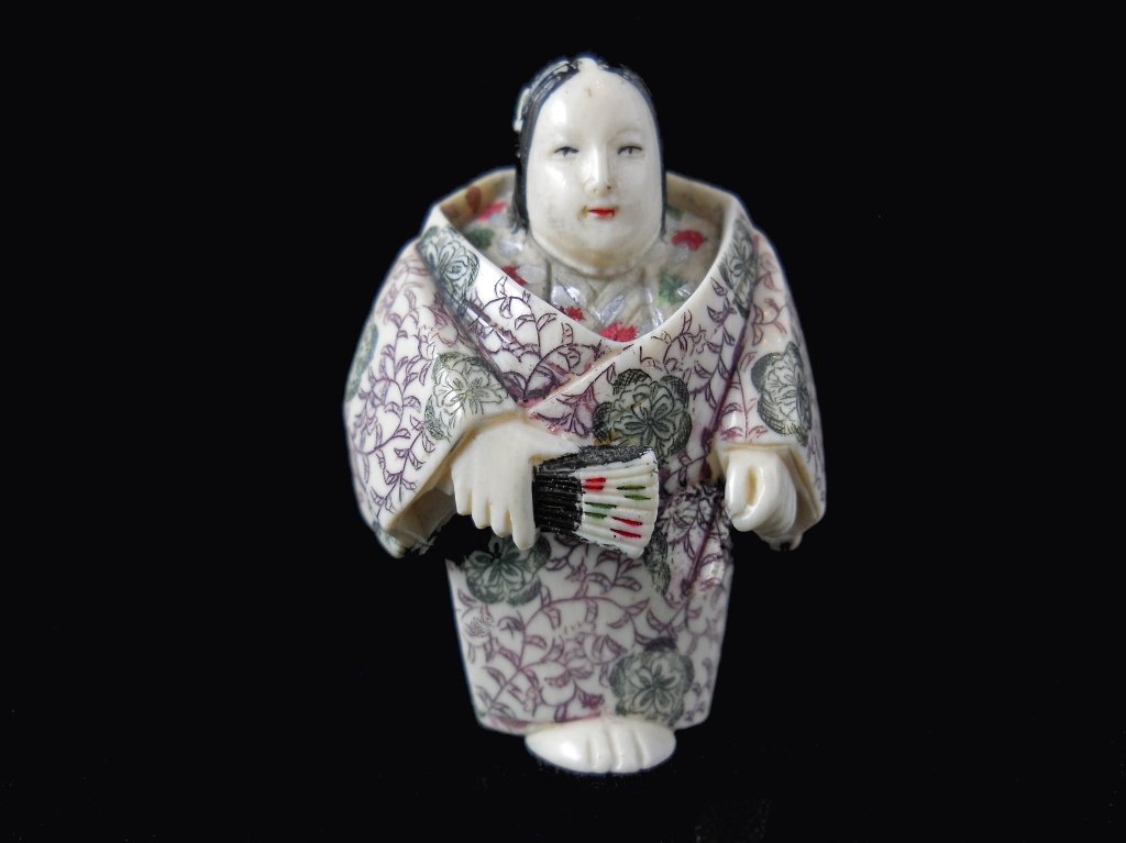 Signed Hand Carved Ivory Female Netsuke: Signed Hand Carved Ivory Female Netsuke measures 2 inches tall